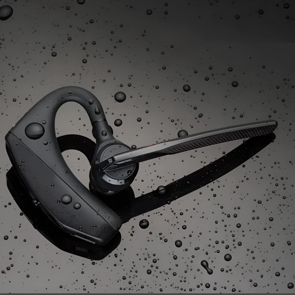 Black Bluetooth sports headphones with USB charging port showing battery display