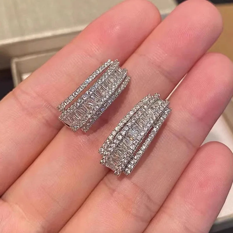 Women's geometric stud earrings with white gold colour finish and inlaid zircon stones
