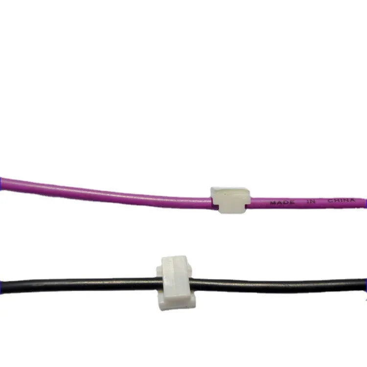 Black PA66 plastic cable management clip with steel wire ring for automotive electronics.