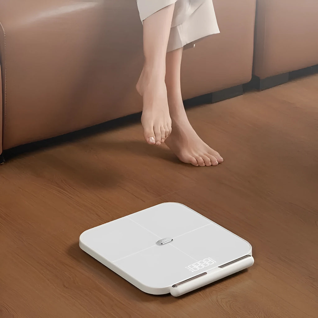 White professional body fat scale with 8 electrodes and tempered glass platform measuring 30x30cm