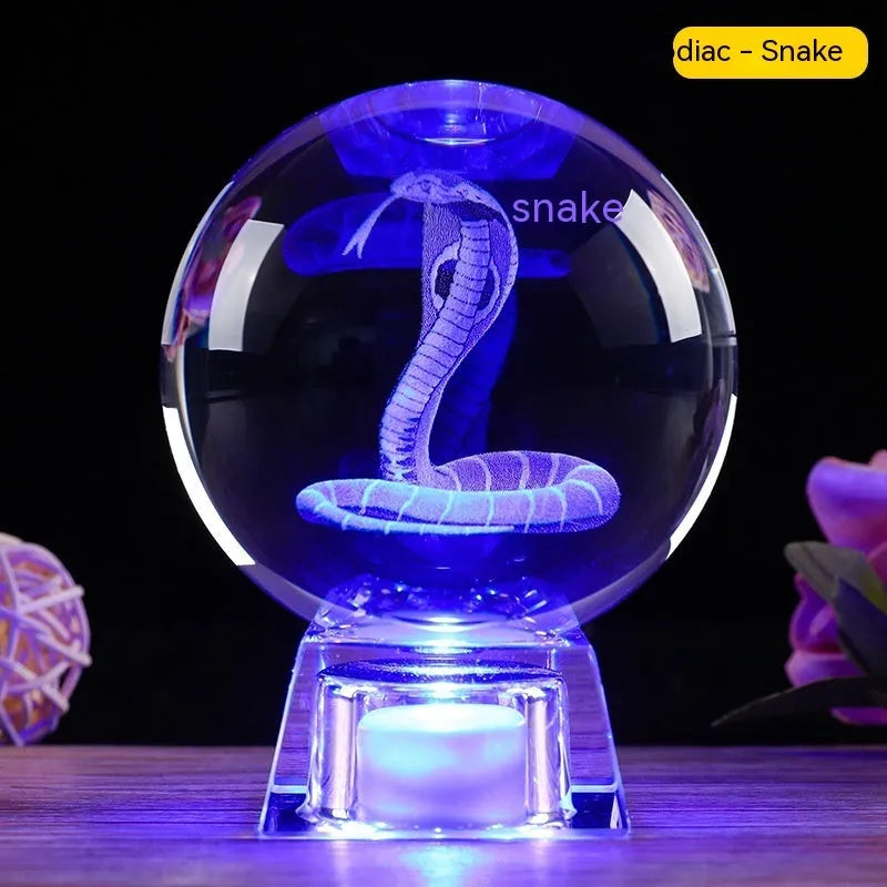 White crystal ball zodiac lamp with Chinese style design and electronic base showing zodiac symbol
