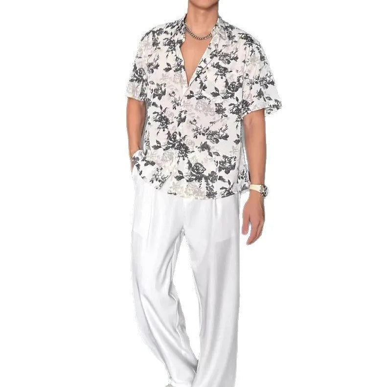 White floral printed casual shirt with short sleeves and loose cardigan-style fit