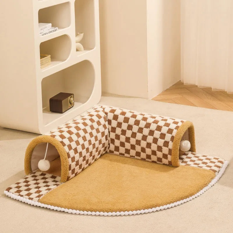 Brown and yellow plush plaid cat tunnel bed with central mat, shown in XL size for indoor cats.