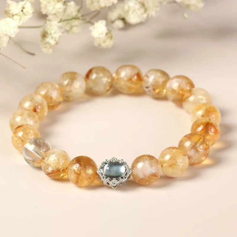 Citrine crystal bracelet with 10mm geometric beads showing grinding treatment details