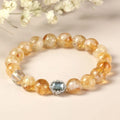 Citrine crystal bracelet with 10mm geometric beads showing grinding treatment details
