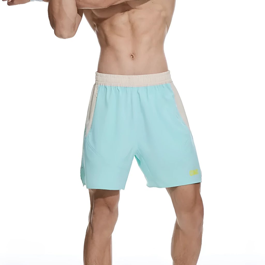 Men's loose grey workout shorts with elastic waist and lace-up fly detail for gym training.