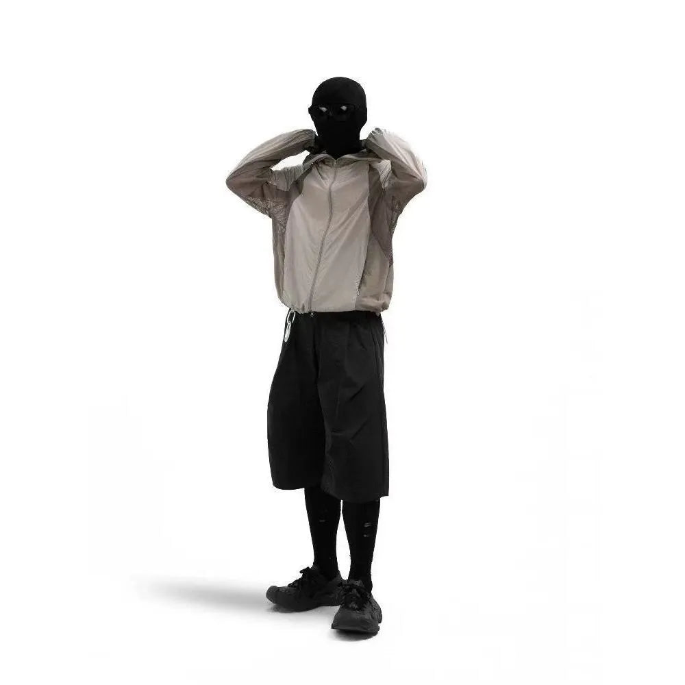 Mesh stitching thin sun protective clothing in desert brown colour showing regular length cut and lightweight construction