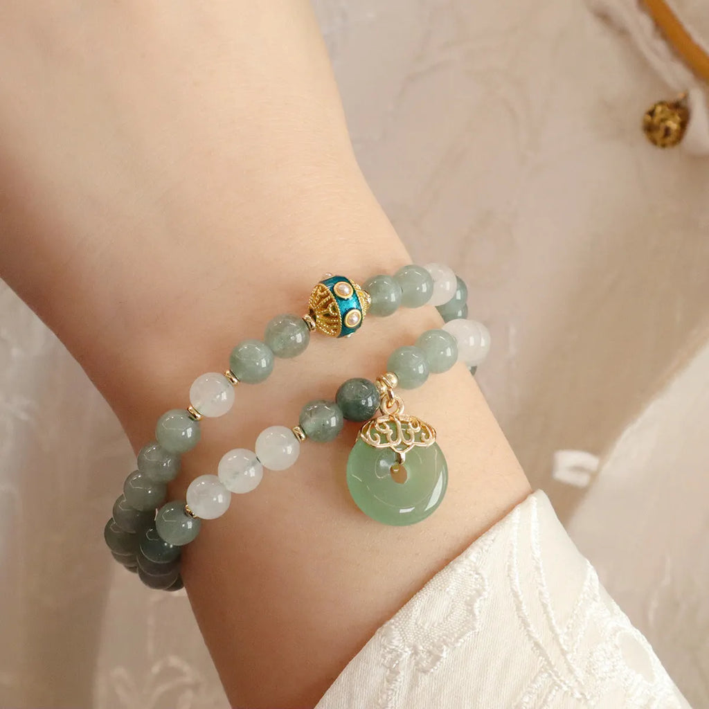 Women's Myanmar jade bracelet with geometric shapes and peace buckle charm on safety buckle