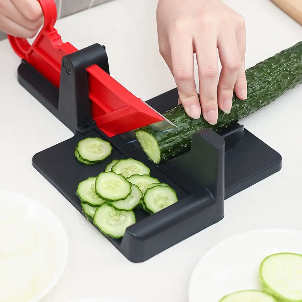 Green and red plastic vegetable cutter with stainless steel blades for carrots and potatoes