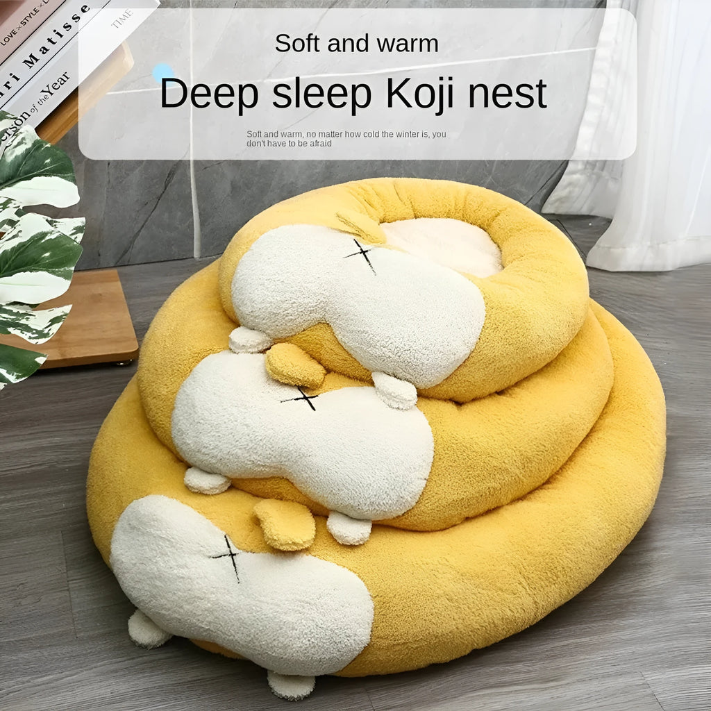 Brown and white corgi-shaped plush dog bed on a wooden floor.