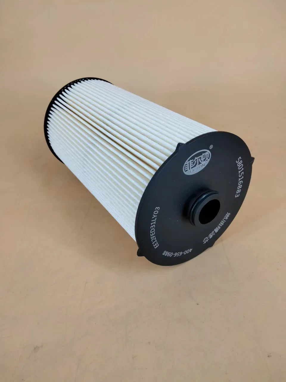 Iveco fuel filter with part numbers 5801516883 and 5801439821, showing folding filter element