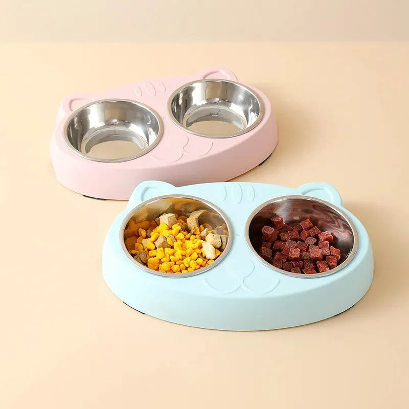 Blue, green, and pink macaron-shaped plastic double bowl pet feeding tray for cats and dogs.