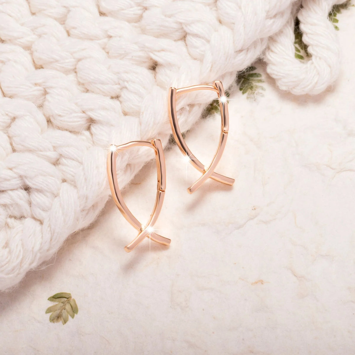 Copper cross earrings with rose gold finish for light luxury jewellery styling