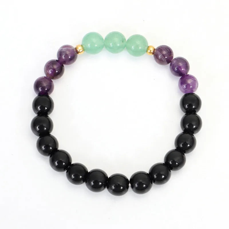 Dongling Long handmade stone bead necklace with alloy lotus pendant and matching bracelet.