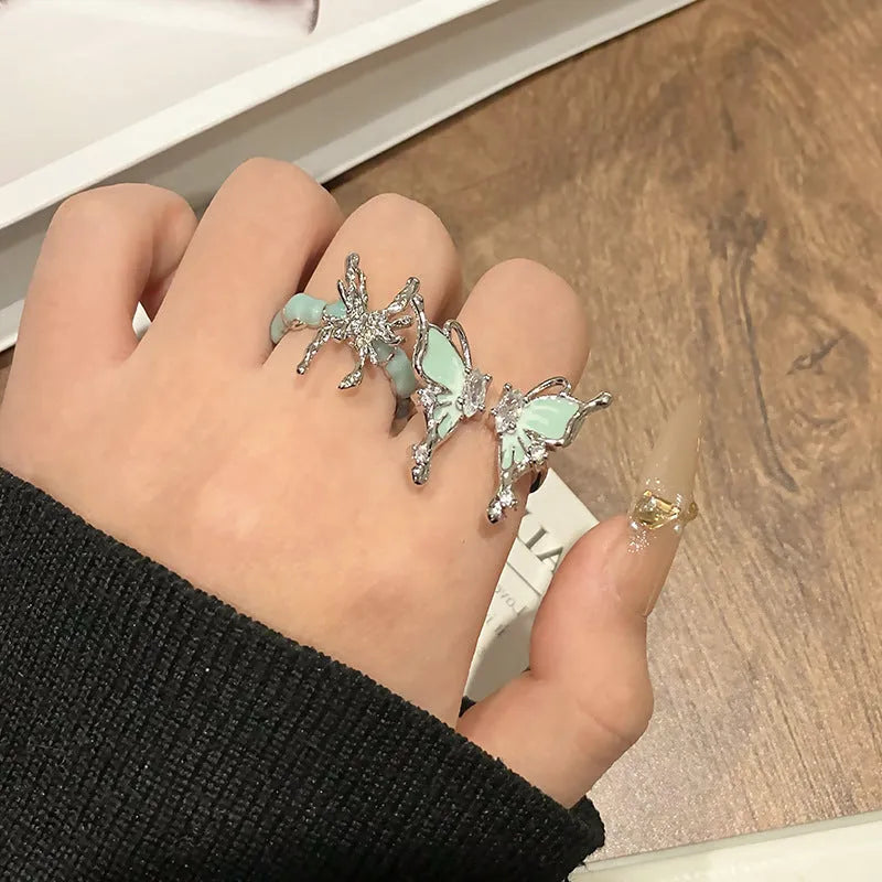Copper butterfly women's ring with open loop design and Chinese-inspired creative jewellery details
