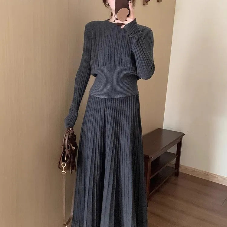 Dark grey knitted long dress suit set with sweater, skirt, and 3D ethnic pattern.