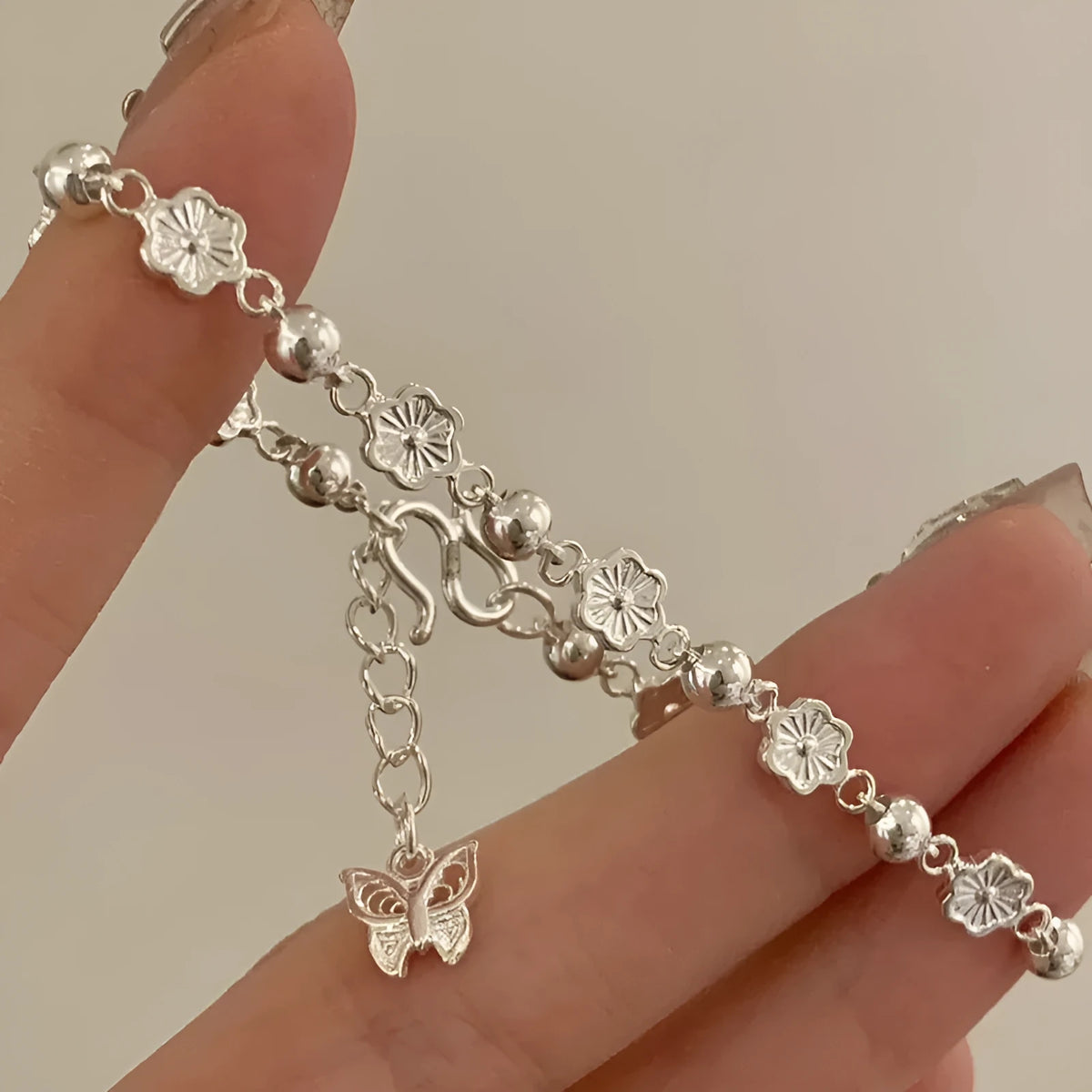 Women's peach heart chain bracelet with butterfly and rose details, alloy, geometric natural style