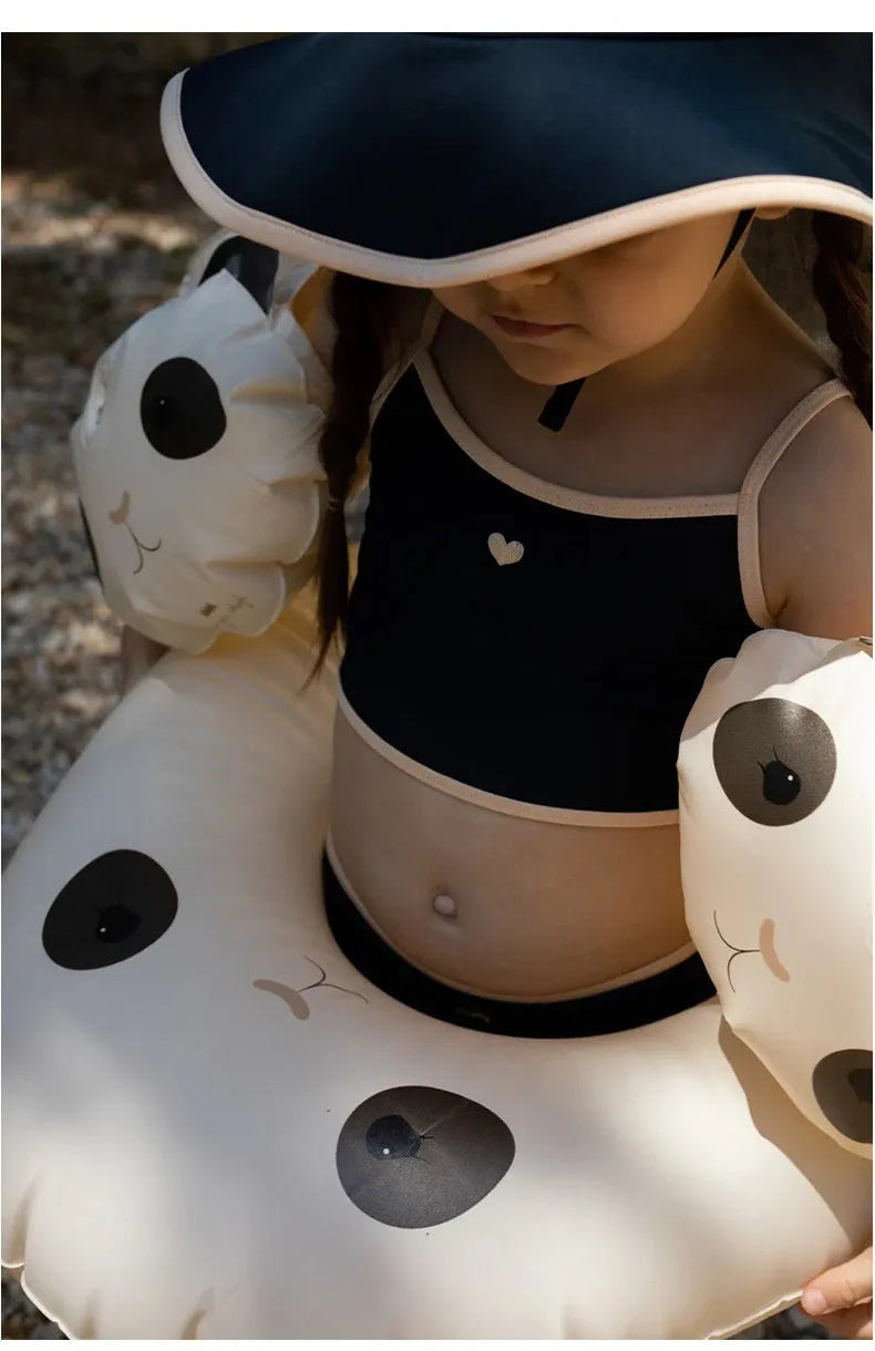 Dark blue split-style briefs swimsuit for baby girls, shown in sizes from 90cm to 130cm.
