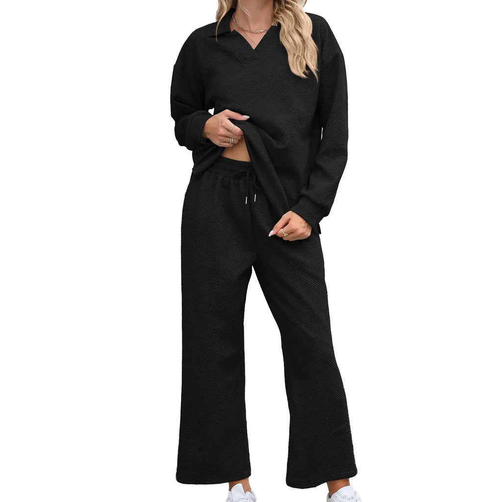 Women's black knitted jacquard suit with geometric pattern, long sleeves, and elastic waist cropped pants