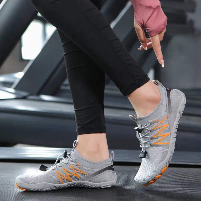 Lightweight training sneakers with striped pattern and non-slip rubber sole shown in multiple colour options.