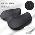 Curved bevel seat cushion for tailbone support in choice of colours on a chair.