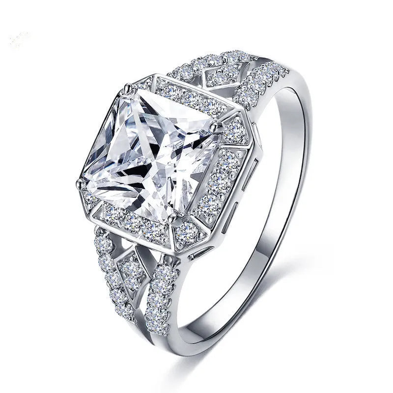 Platinum-colour geometric women's ring with hollow design and zircon inlay