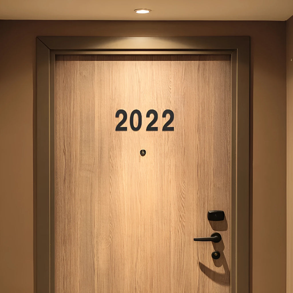 Black stainless steel adhesive house numbers and letters showing digits 1 through 9 and letters A to F.