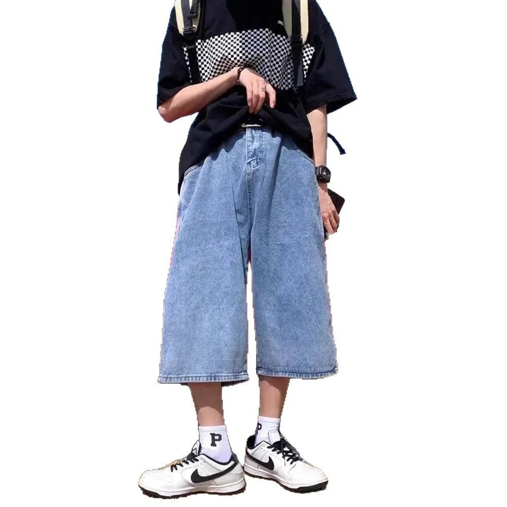 Man's washed light blue denim shorts with a high waist, cropped length, and straight legs.