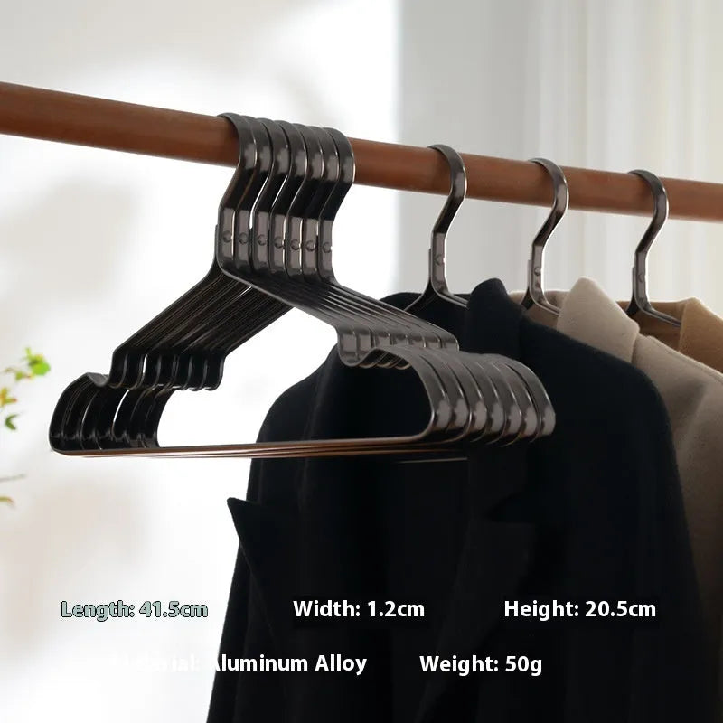Elegant black metal clothes hanger with anti-slip and anti-rust coating on a white background.