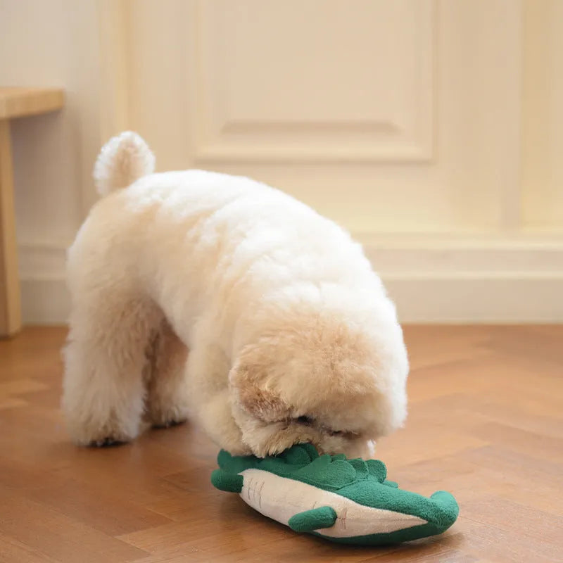 Green plush toy dog measuring 35cm long on a white background