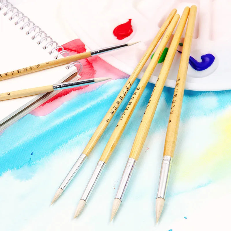 Six wooden-handled artistic brushes with wool-pointed tips for textile and embroidery crafts.