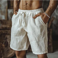 Men's straight-leg casual beach shorts in cotton linen blend fabric, shown in a solid colour.
