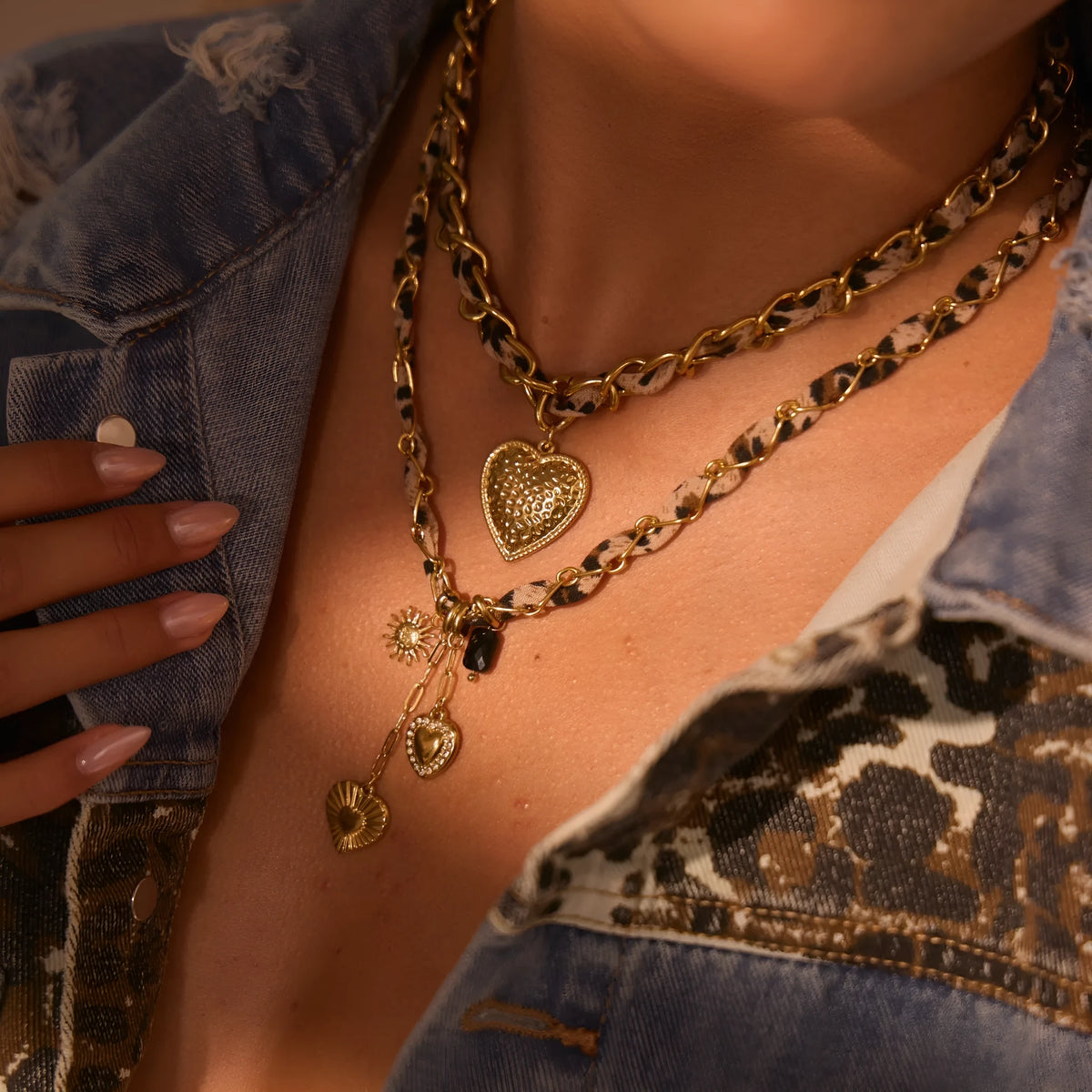 Women's stainless steel necklace with geometric leopard love pendant on adjustable chain