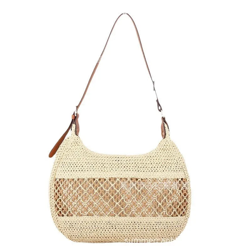 Women's straw cross body bag in khaki colour showing horizontal square shape and woven texture