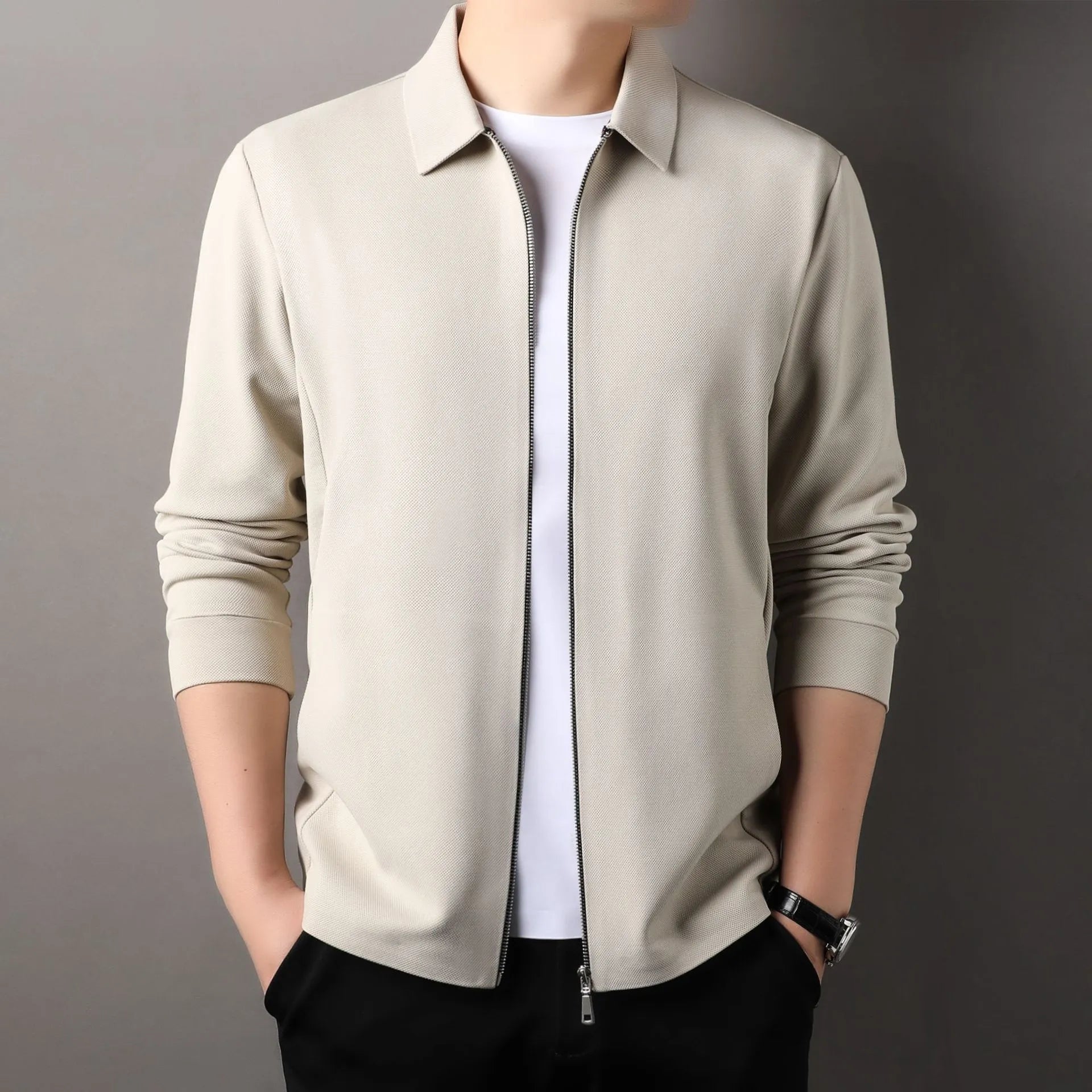 Men's jacket in polyester fabric, shown in black, dark grey, and apricot colours, featuring long sleeves and a straight hem.