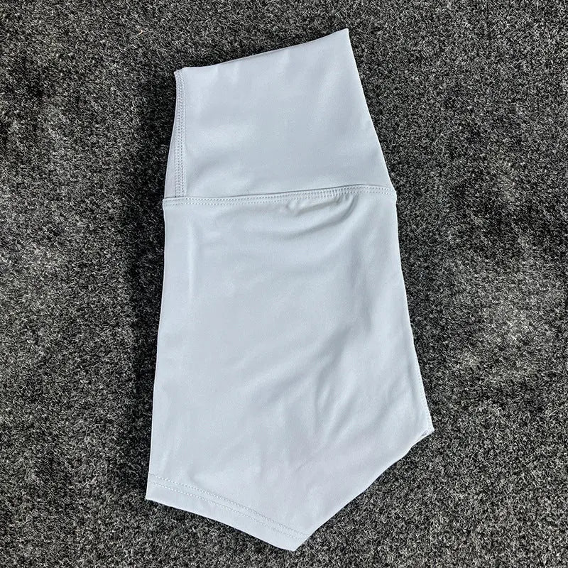 Ladies high-waist yoga shorts in nylon fabric, shown in pink litchi colour
