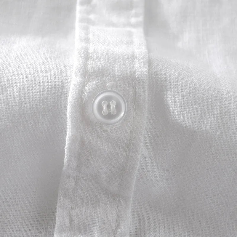 Men's loose fit short sleeve shirt in a cotton linen blend, shown in a solid colour.