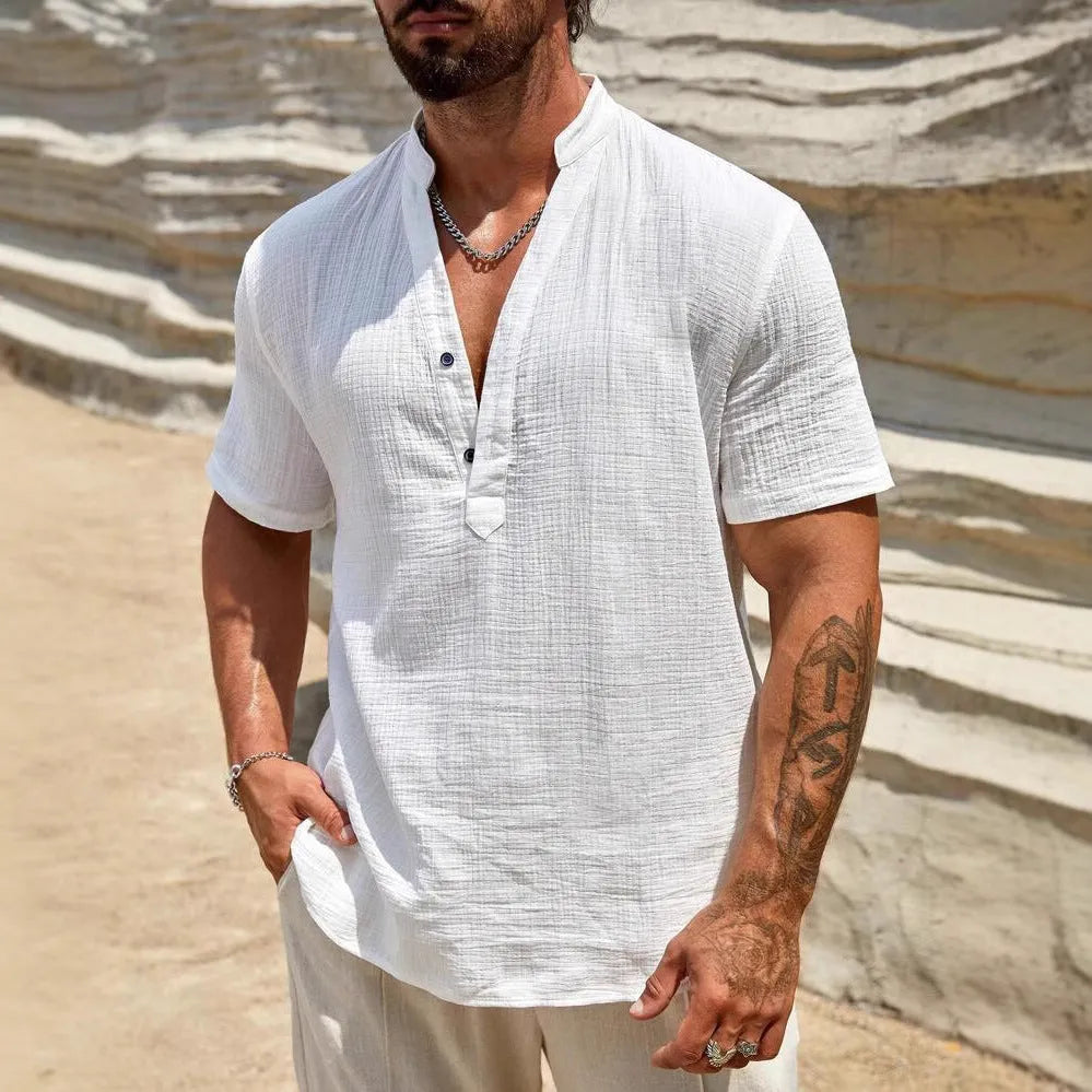 Men's solid colour short-sleeved casual shirt with stand collar on a hanger
