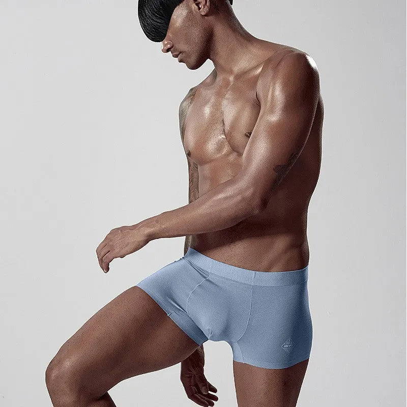 Men's seamless one-piece underwear in modal fabric showing body shaping design in solid colours