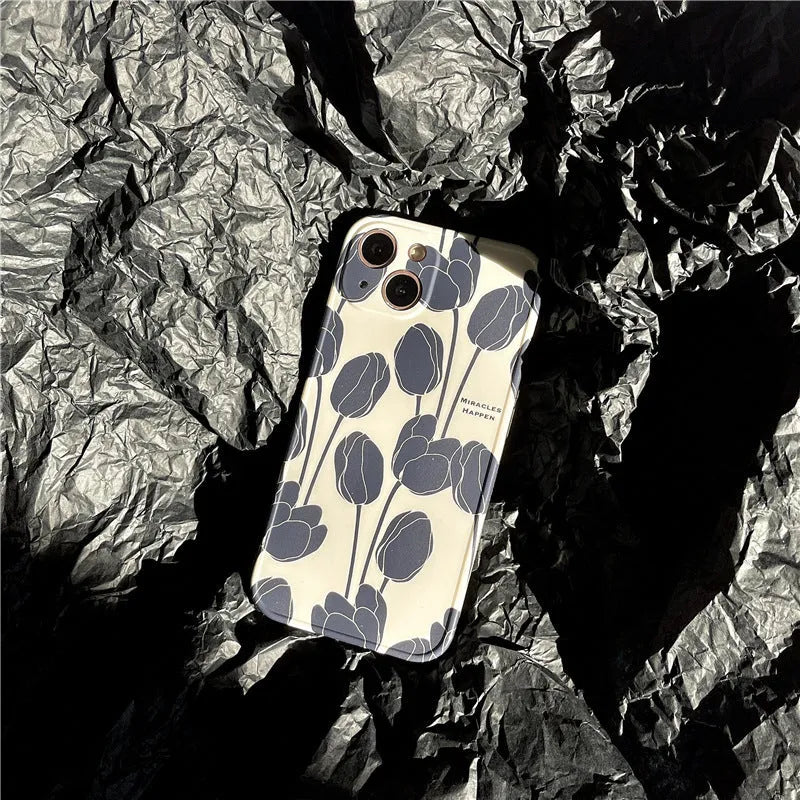 Black silicone iPhone case with tulip design for iPhone 13, 12, 11, X, and 7/8 Plus models