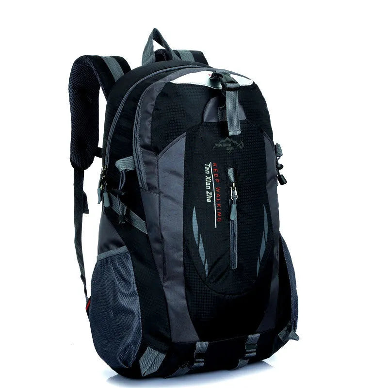 Large outdoor travel backpack in Oxford cloth showing computer pocket, dual shoulder straps, and zipper opening