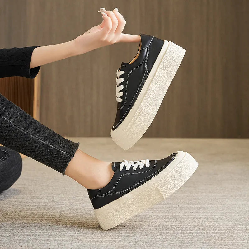 Women's black platform casual sports shoes with embossed cowhide upper and tied lace design