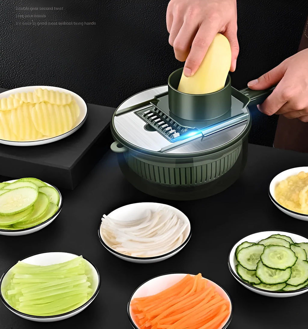 Multifunctional vegetable slicer in grey or green with five stainless steel blades, hand guard and paring knife