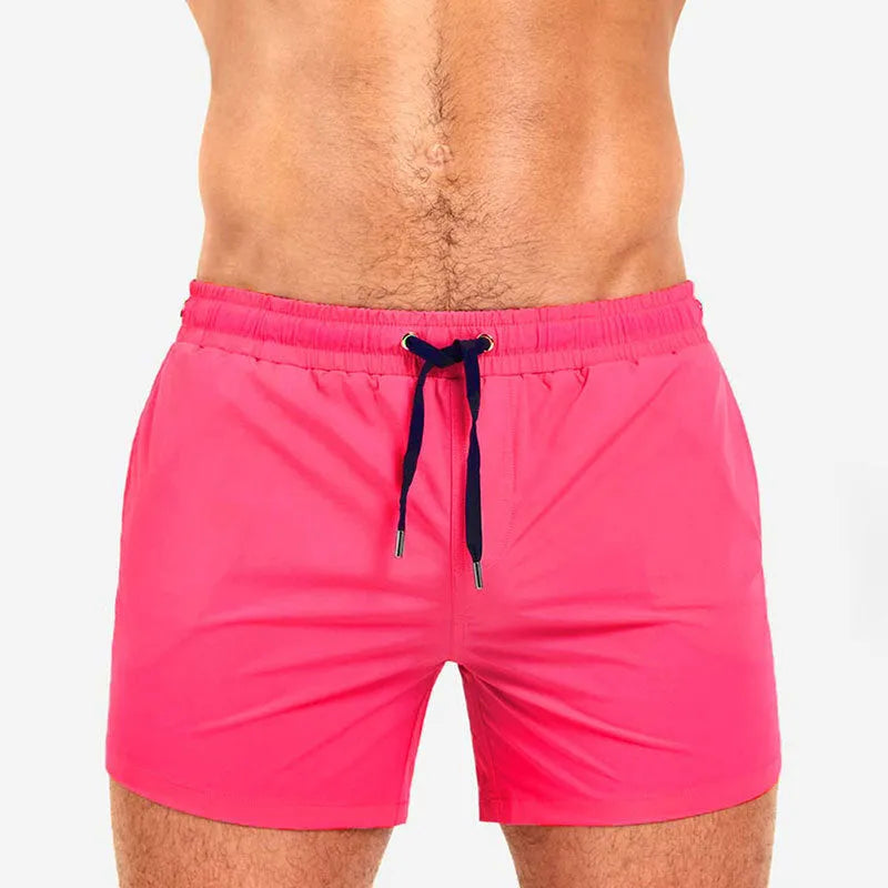 Polyester sports shorts with mesh lining in Army Green colour, shown flat.