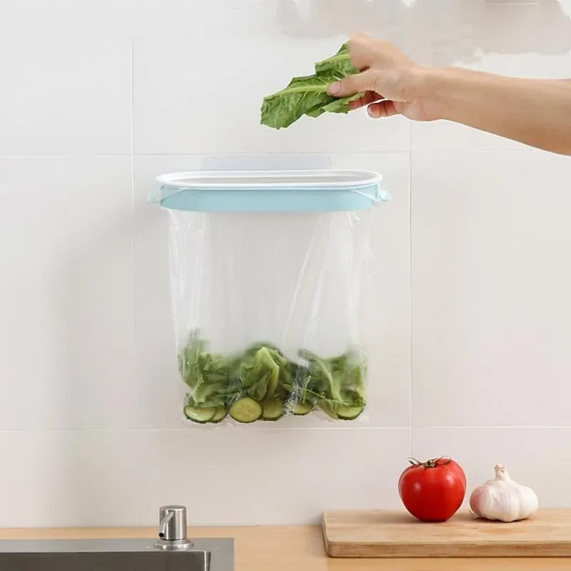 Plastic kitchen garbage bag storage rack in blue or pink for cabinet organisation