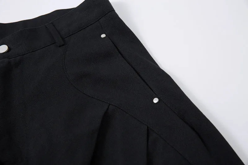 Men's black pleated machete casual trousers with wide-leg loose fit and cotton fabric