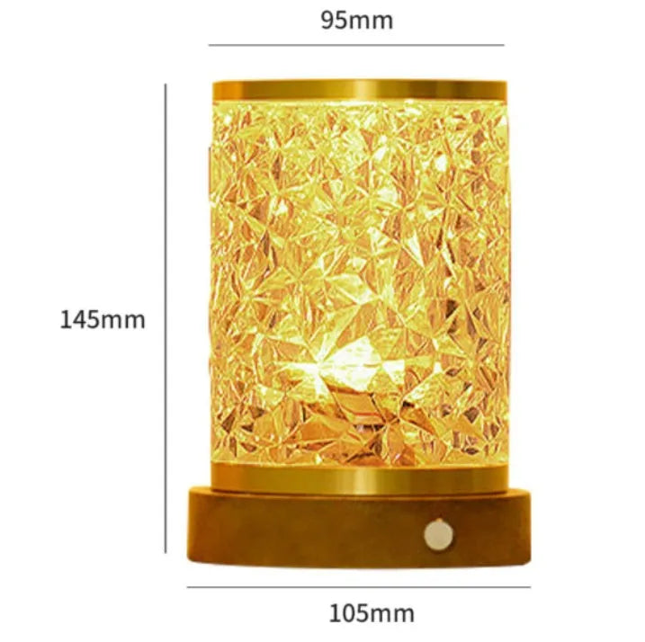 Small rotating water ripple night light on a solid wood base with touch control.