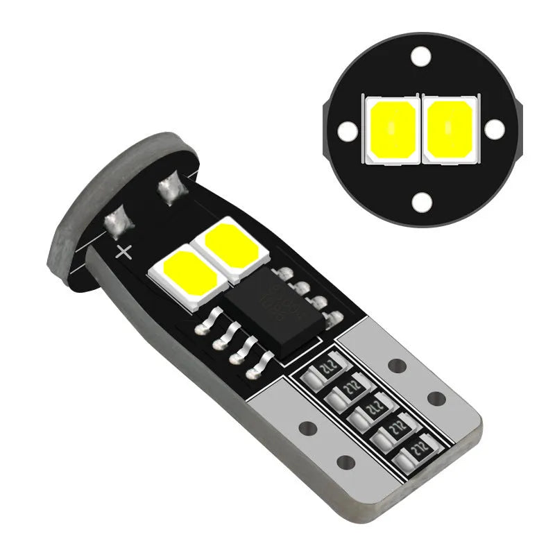 Small LED car licence plate reading light with fibreboard construction