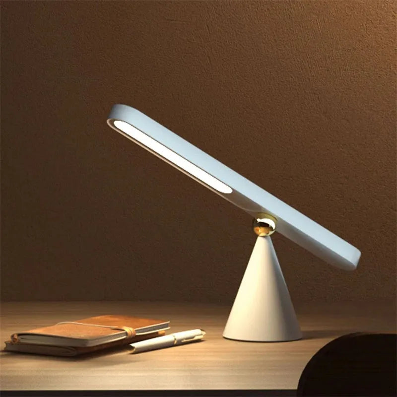 Geometric USB desk lamp with magnetic suction wall mount in white colour