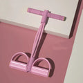 Four-piece yoga fitness set with leg stretcher, yoga ring, pedal puller, and figure-eight tension rope.
